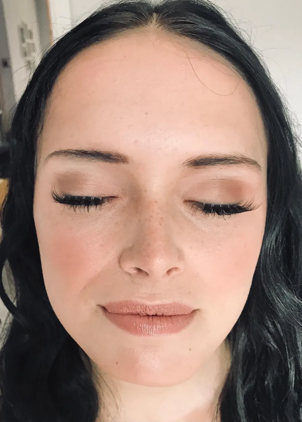 Natural prom makeup with soft rose tones